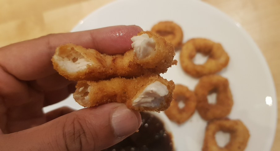 Cooked chicken ring opened to show cooked meat